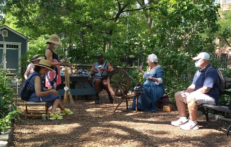 Spinning in the garden during the Battle of Brooklyn commemoration event, August 2022.